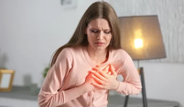 woman-chest-heart-pain